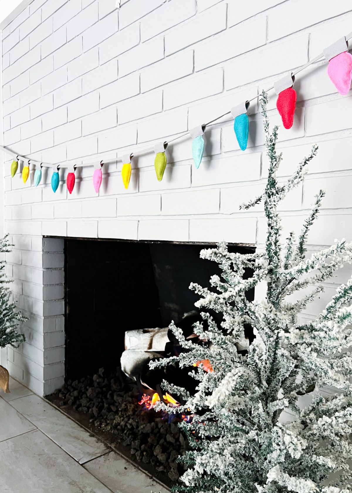 Felt Bulb Garland Tutorial - Finished Garland on fireplace