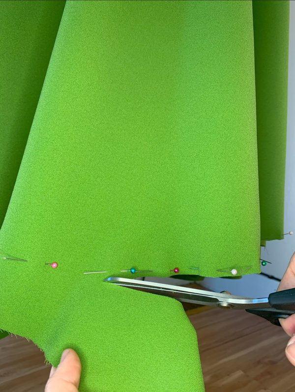 Trimming a skirt hem under pins