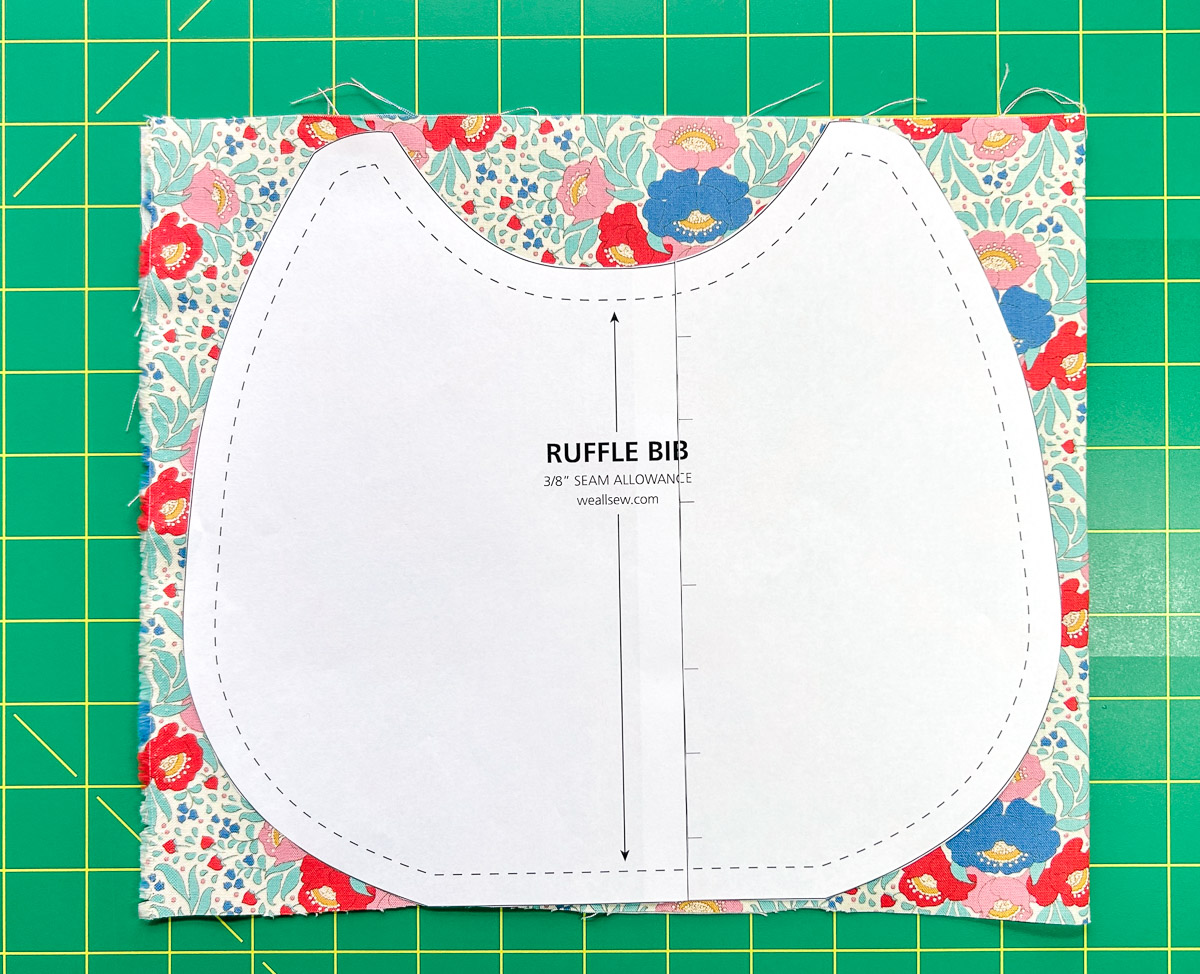 ruffle bib pattern on fabric against 12" x 12" batting