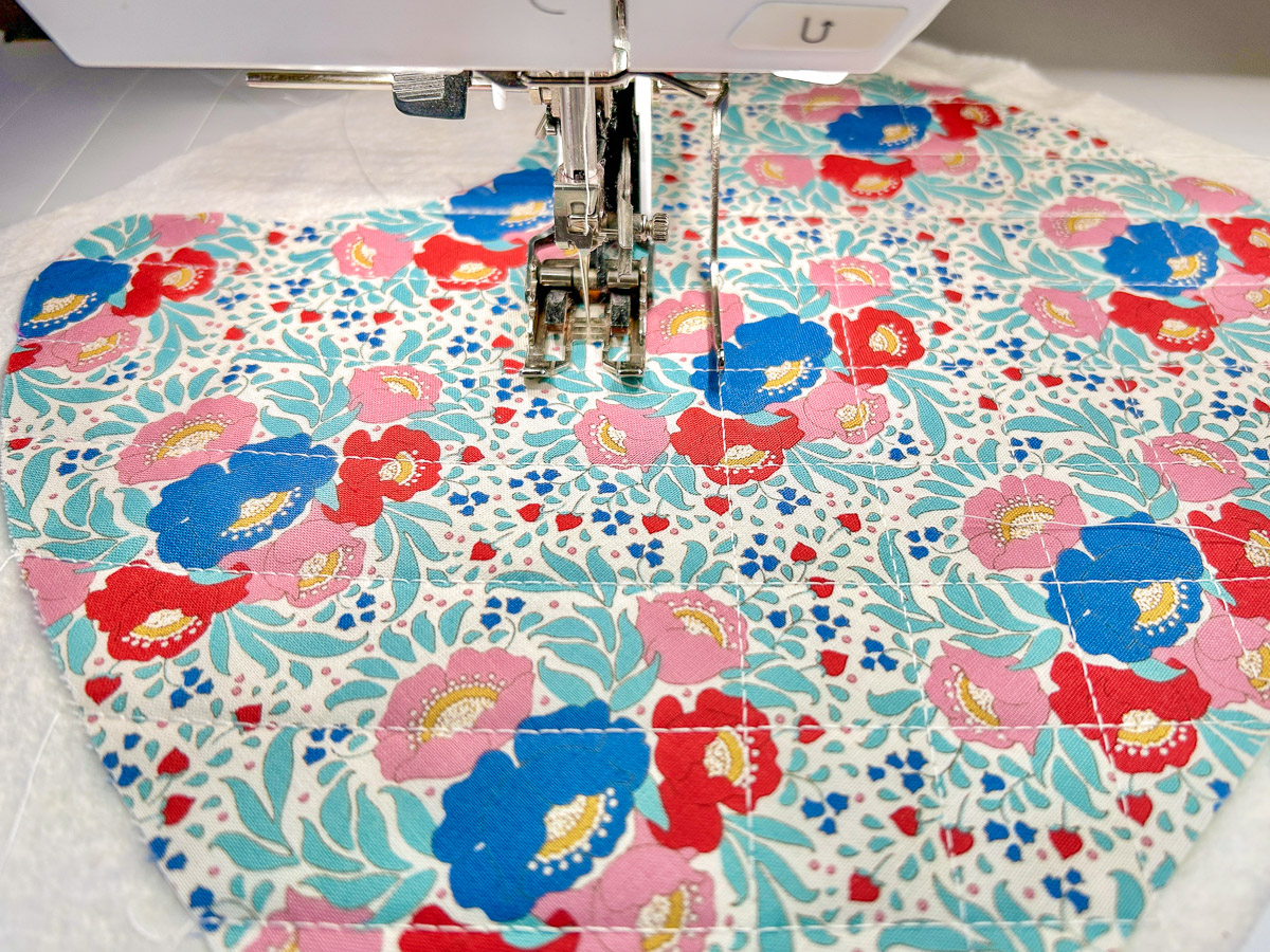 Crosshatch pattern on colorful bib