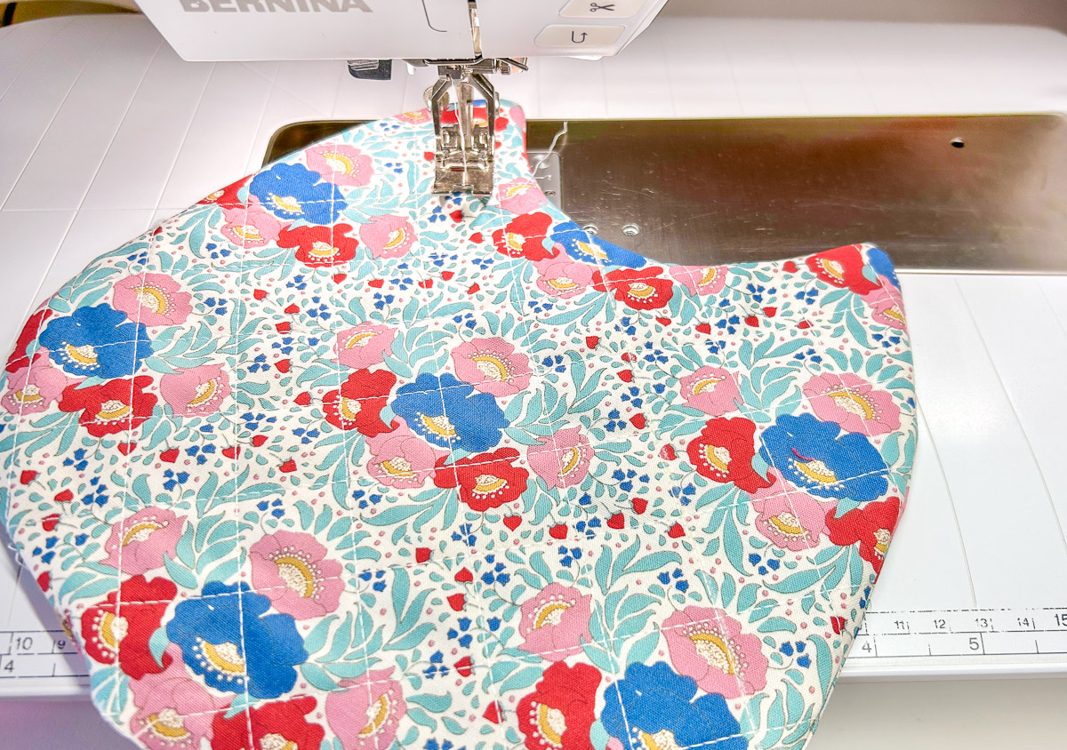 Bib facing upwards on sewing machine