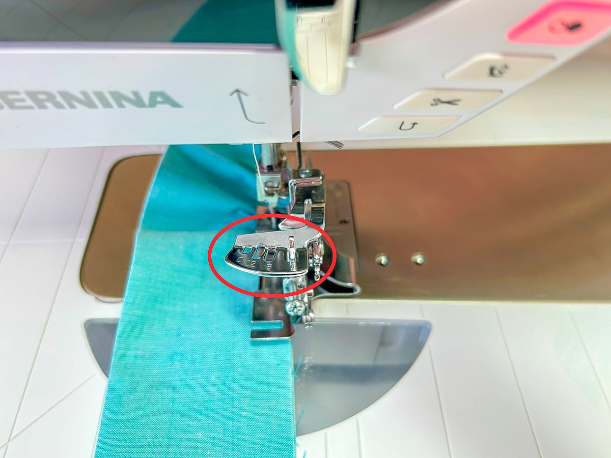 Red circle identifying where to attach Ruffler Foot #86 on machine