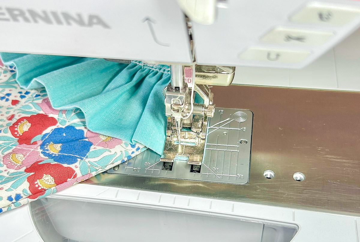 Close up view of tacking end of blue ruffle