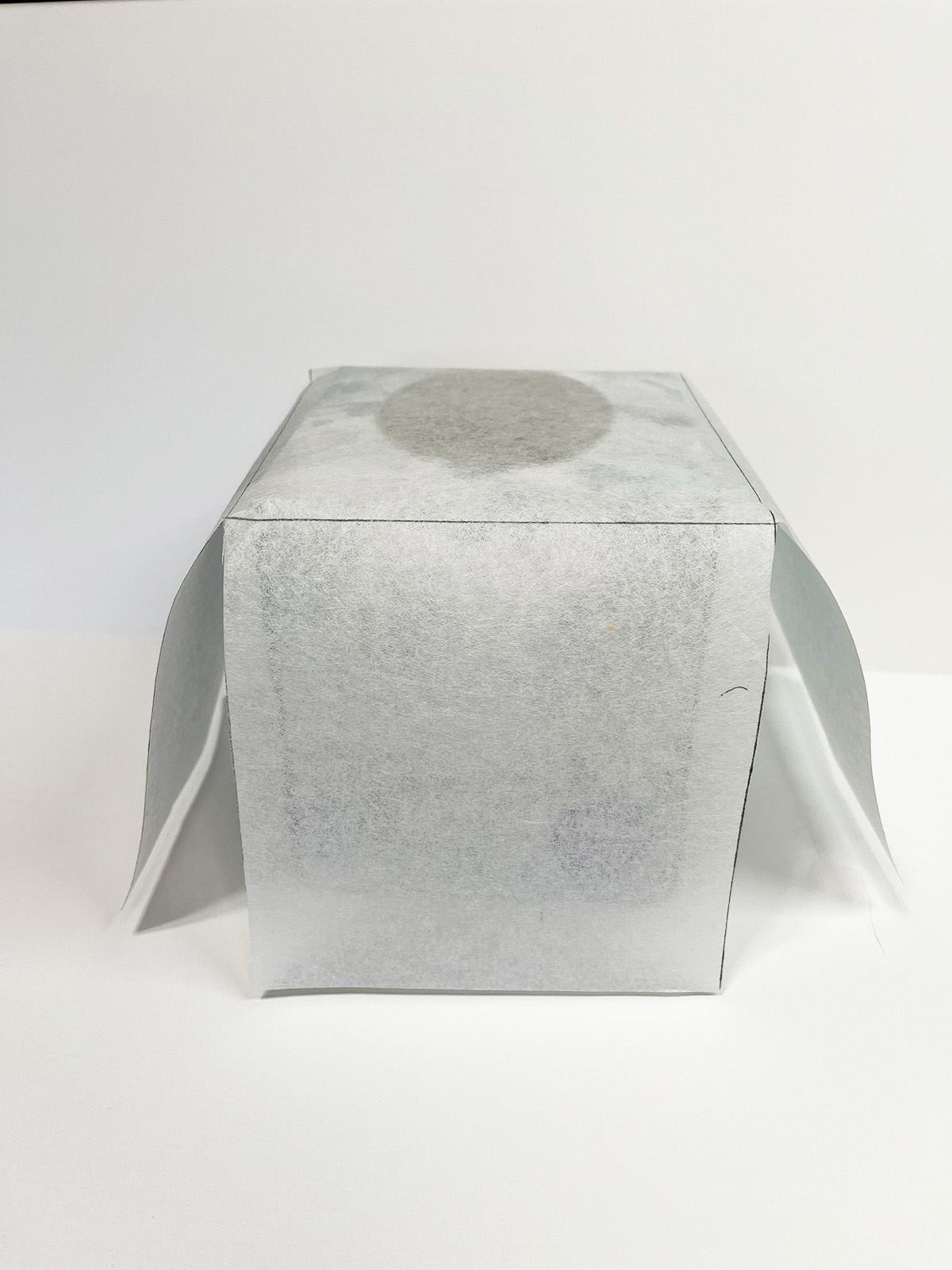 pattern pieces shaped into a box.