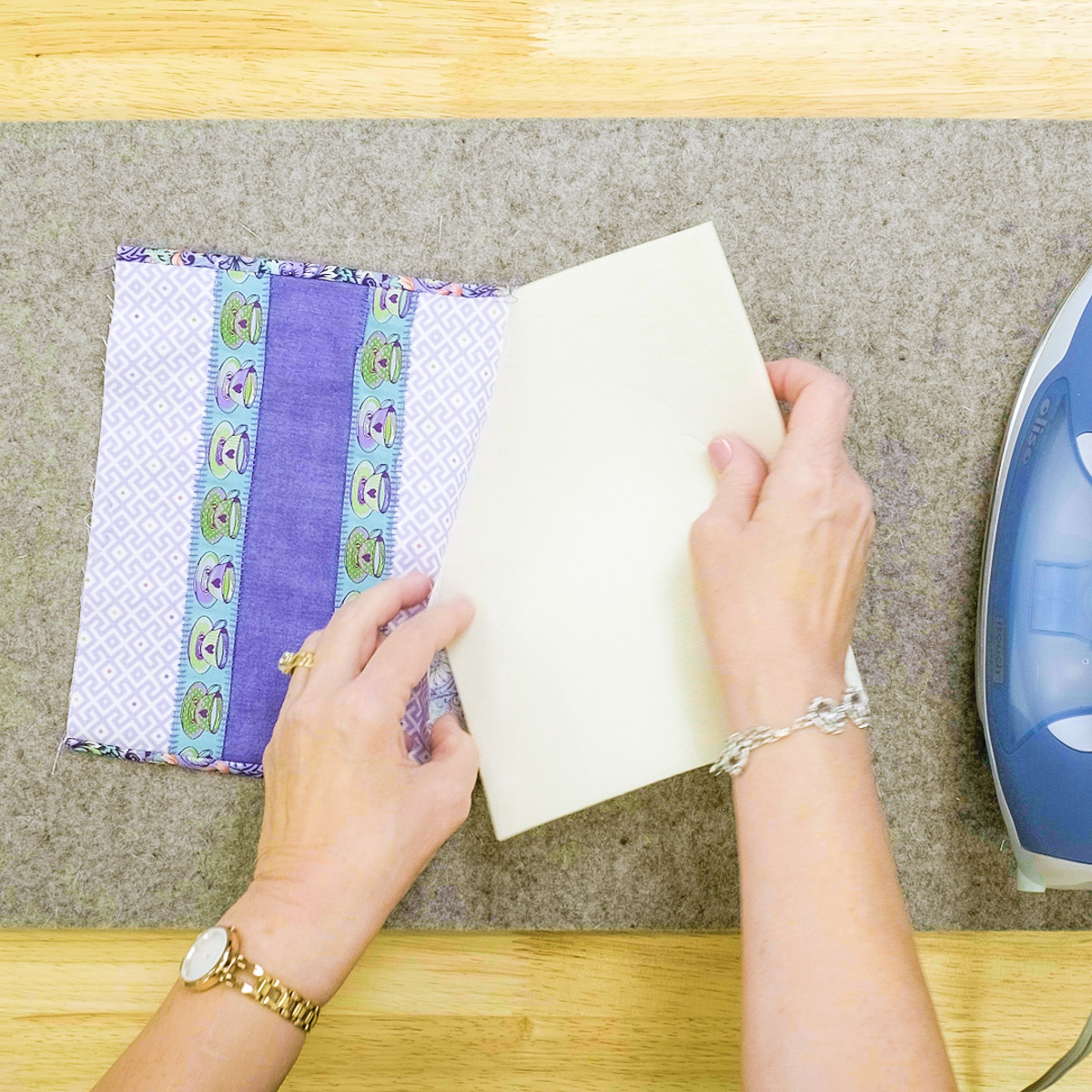 Inserting stabilizing between the two layers of fabric.