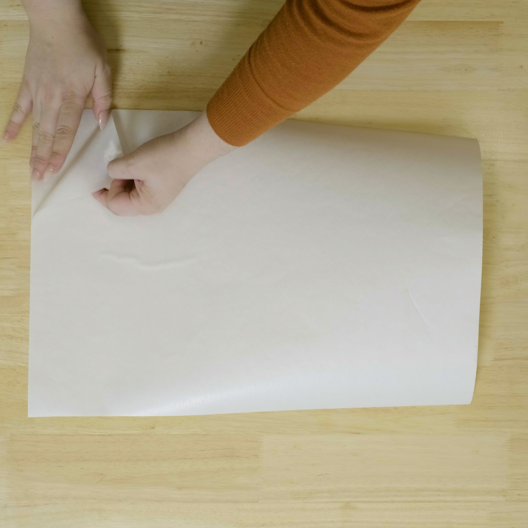 Paper backing being removed