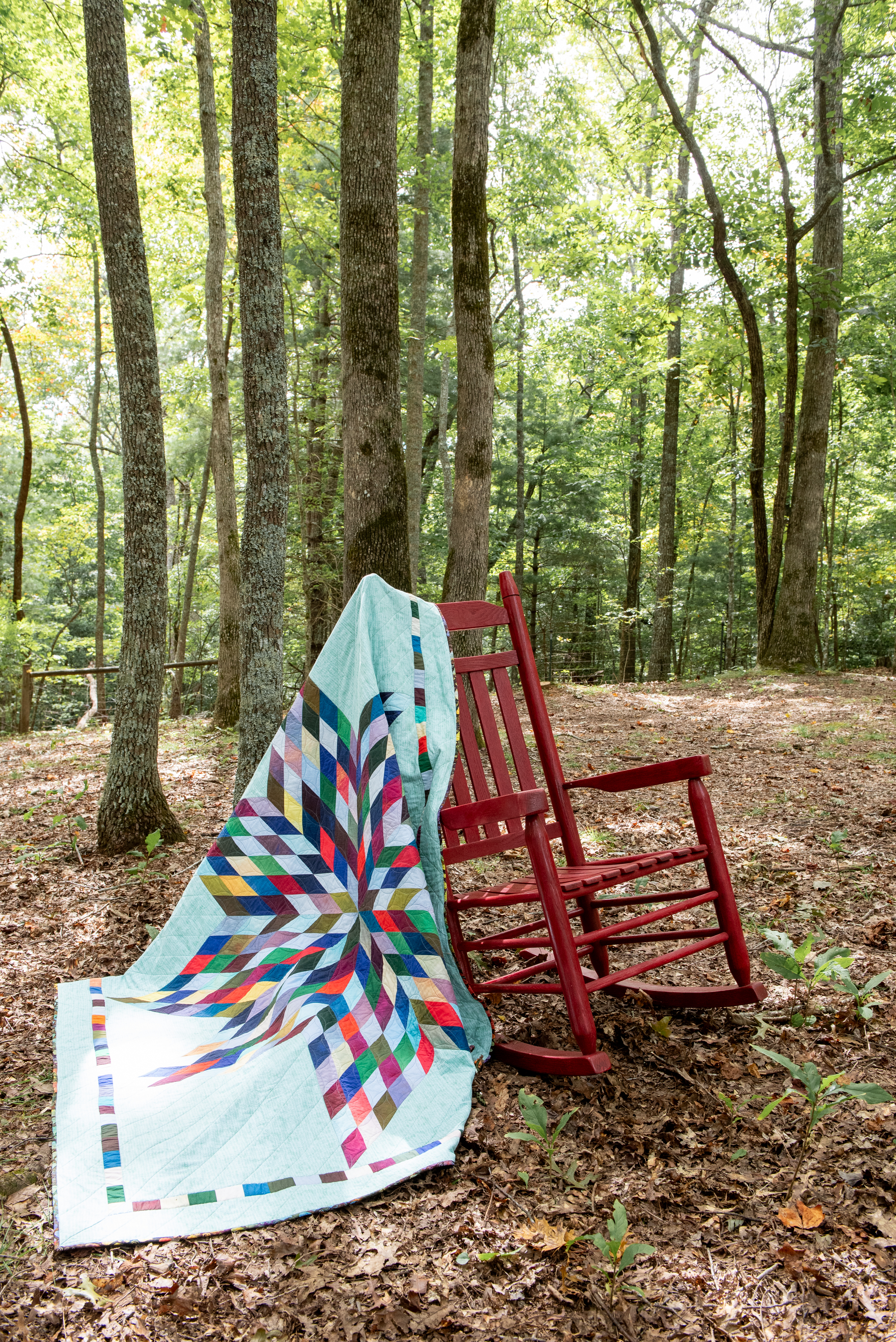 Evenly spaced straight line quilting in the setting squares and triangles