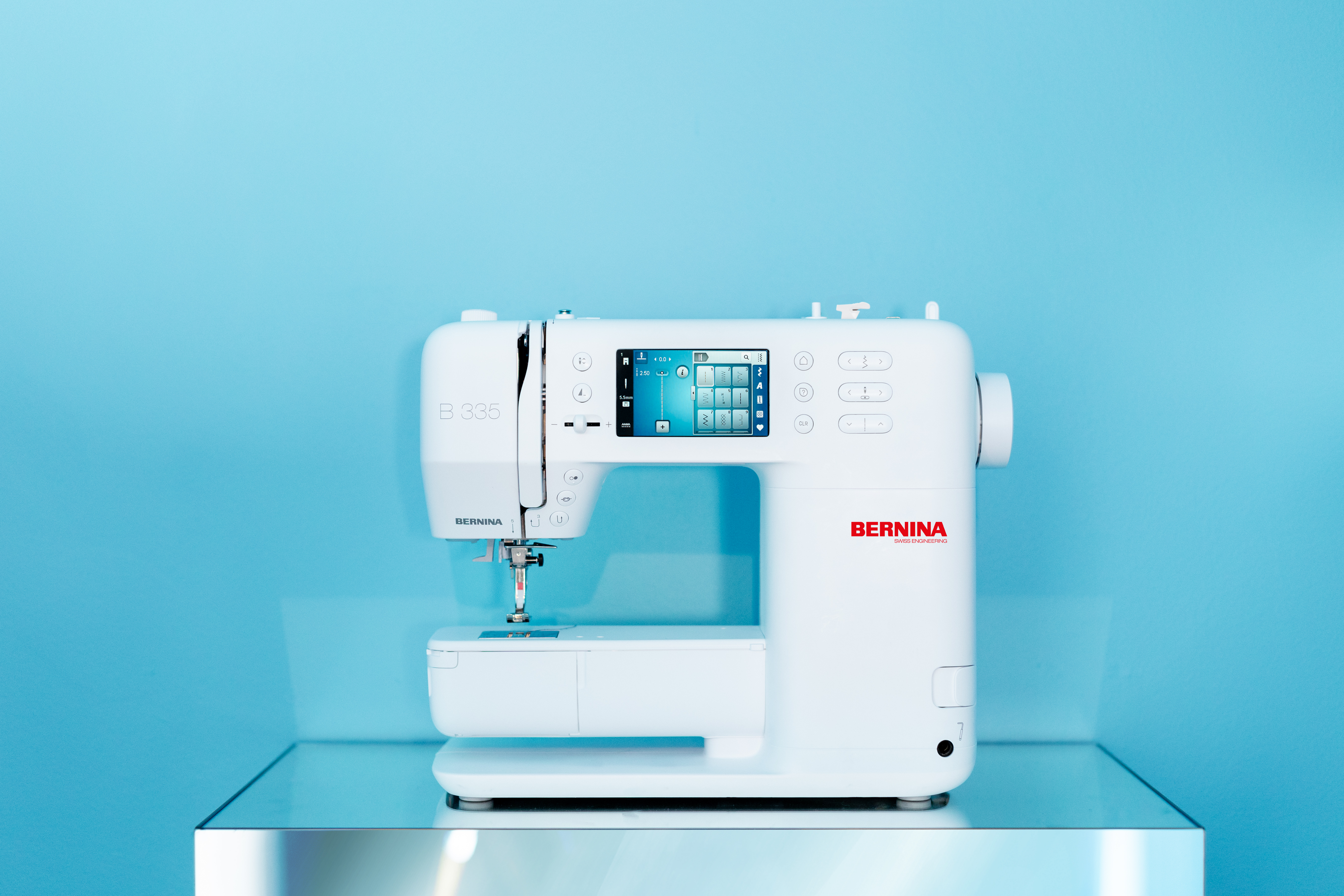 B 335 machine with blue background