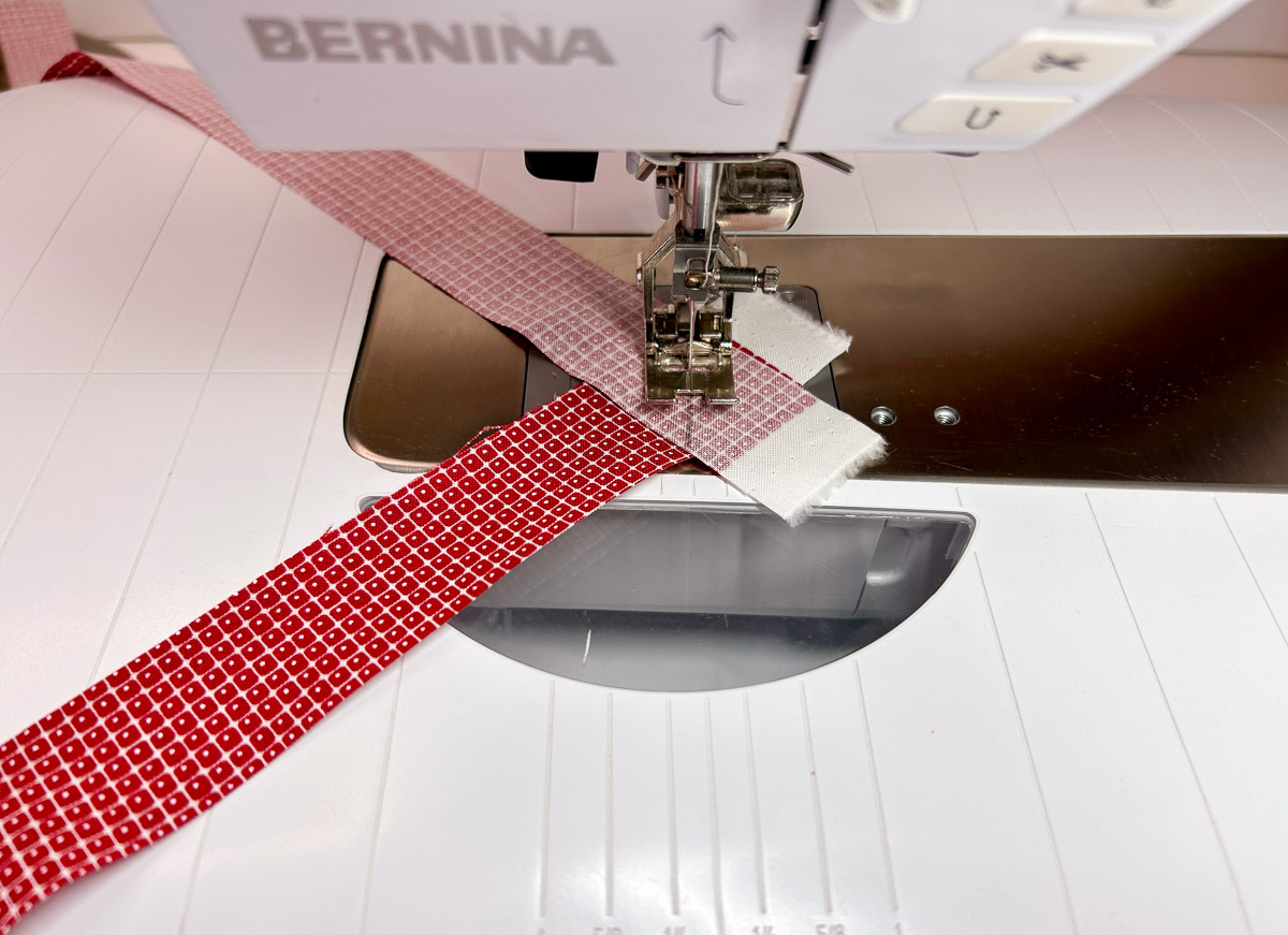 sewing binding strips at angle.