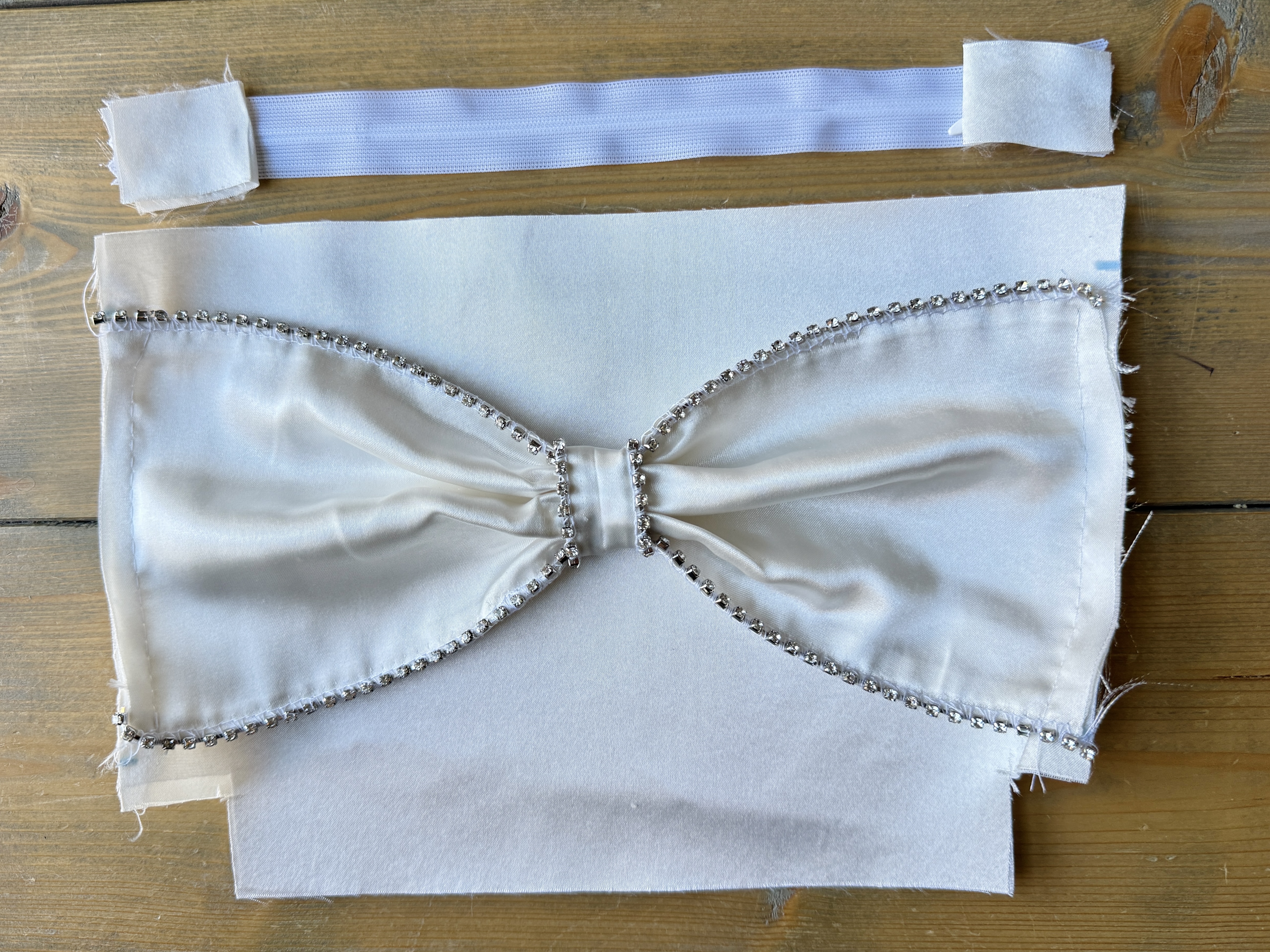 Lower the presser foot and sew a few stitches to stabilize the rhinestones. It is now prepped and ready to attach to the fabric.