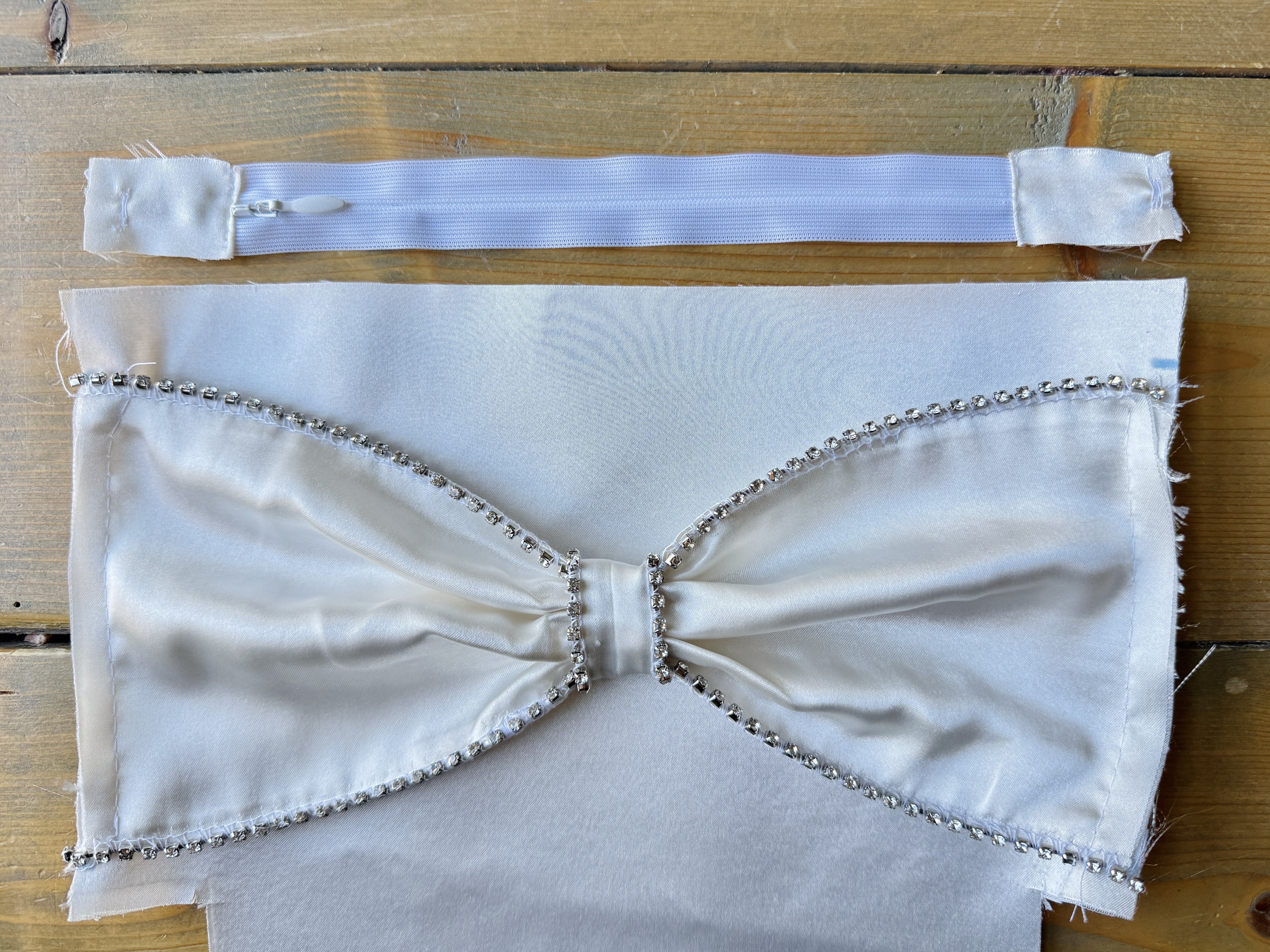 Lower the presser foot and sew a few stitches to stabilize the rhinestones. It is now prepped and ready to attach to the fabric.