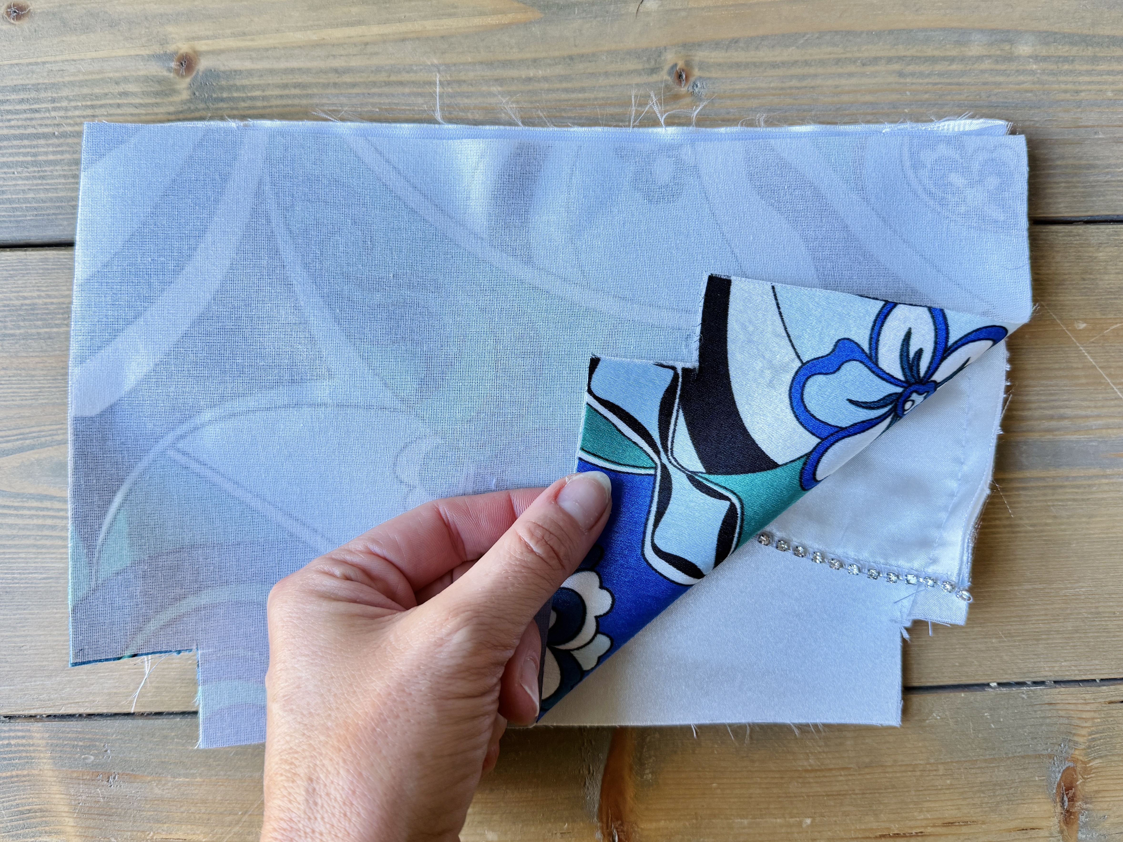 Using a zip foot, sew the zip to the bag.