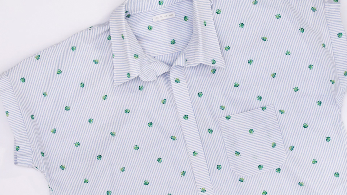 A close up of a shirt button placket
