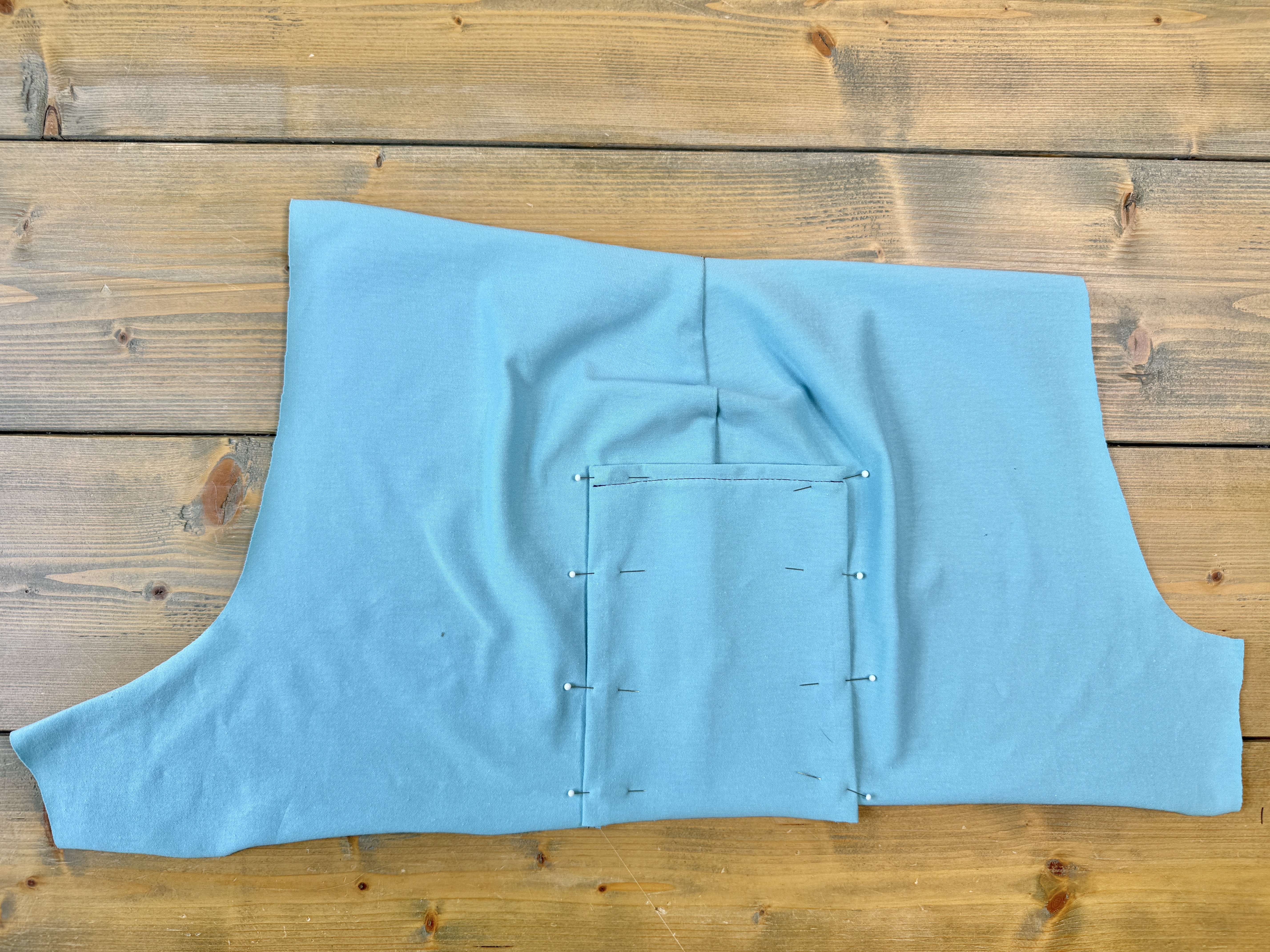 place pocket along long edges